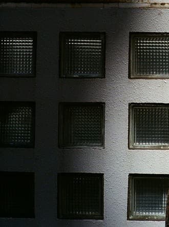 Textured brick pattern glass panel